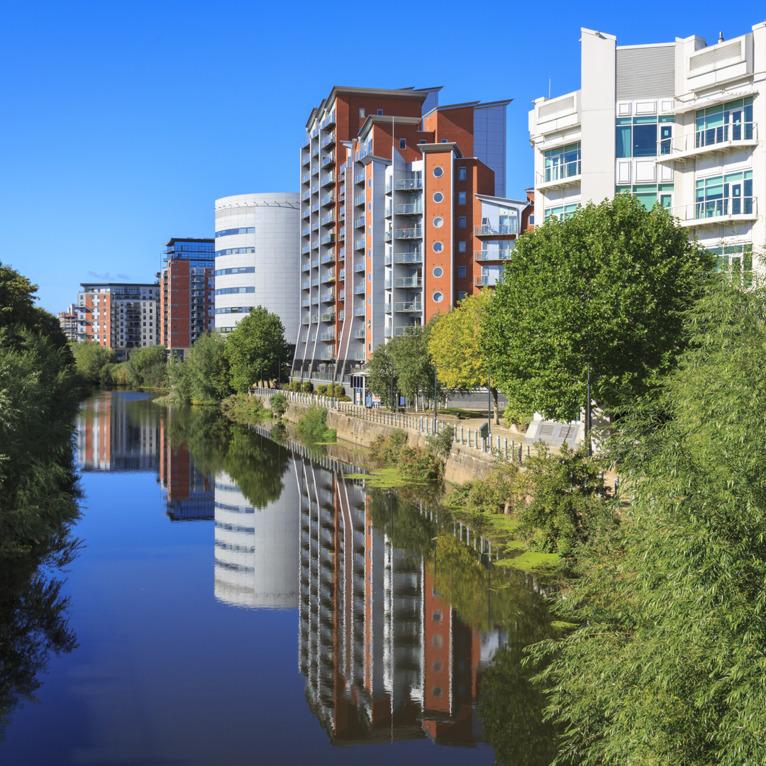 Apartment buildings alongside river