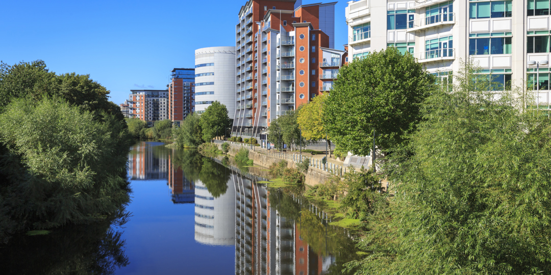 Apartment buildings alongside river