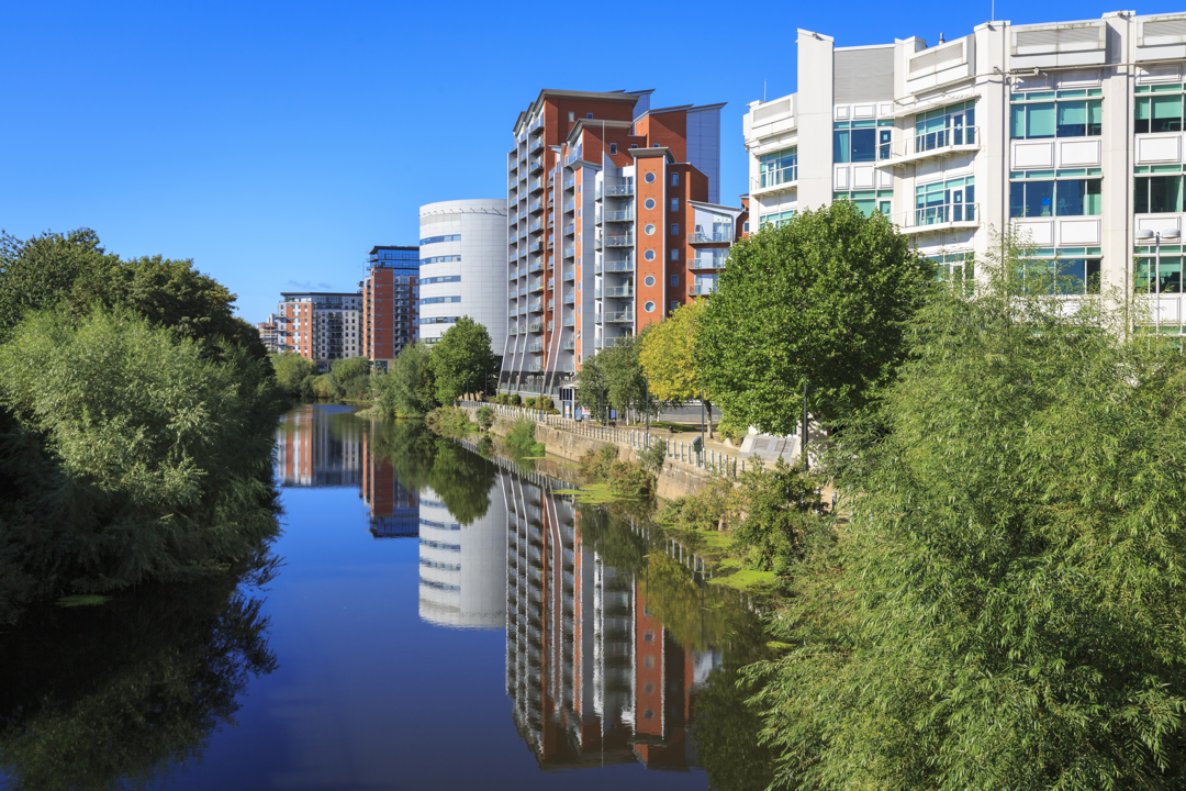 Apartment buildings alongside river